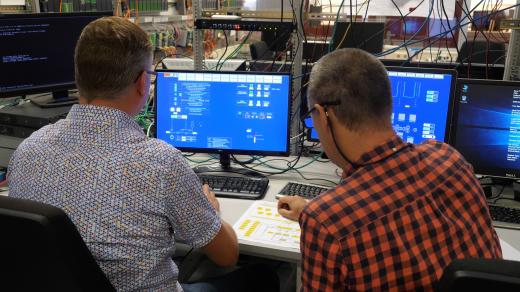 colleagues working with systems