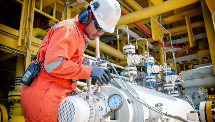 Engineer working on pressure tank